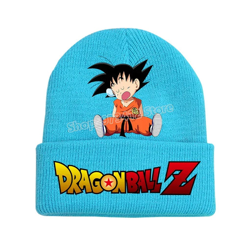 Turquoise reverse hat Dragon Ball - Goku child sitting and smiling