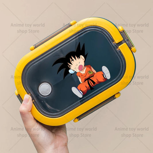 Boîte à goûter jaune Dragon Ball - Goku enfant assis et souriant