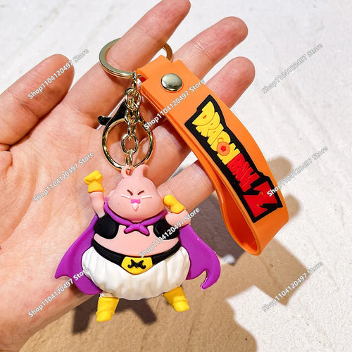 Llavero de Dragon Ball Majin Buu sonriente con cordón naranja