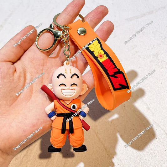 Portachiavi Dragon Ball Crilin sorridente con laccetto arancione