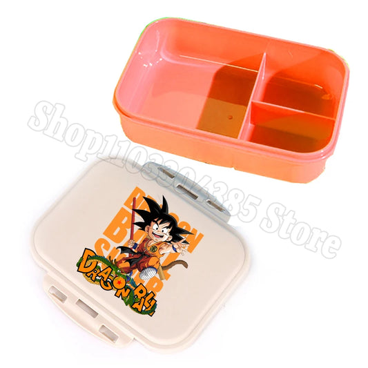 Boîte à goûter compartimentée orange Dragon Ball - Goku souriant et lettrage orange