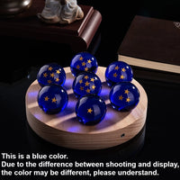 7 blaue Kugeln auf runder Basis
