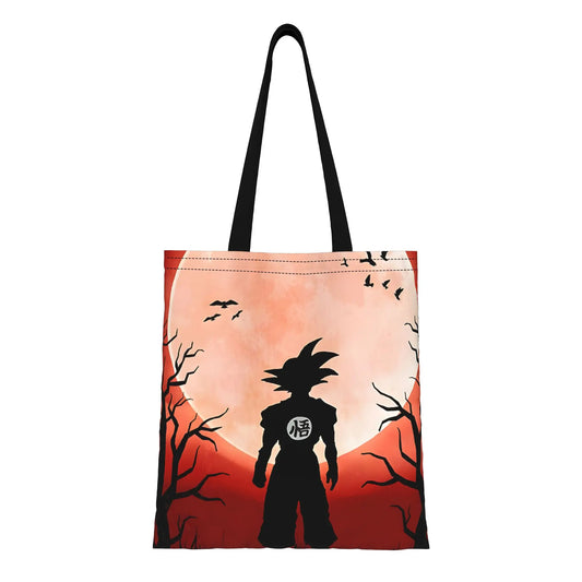 Tote bag rouge Dragon Ball - silhouette de Goku devant les arbres