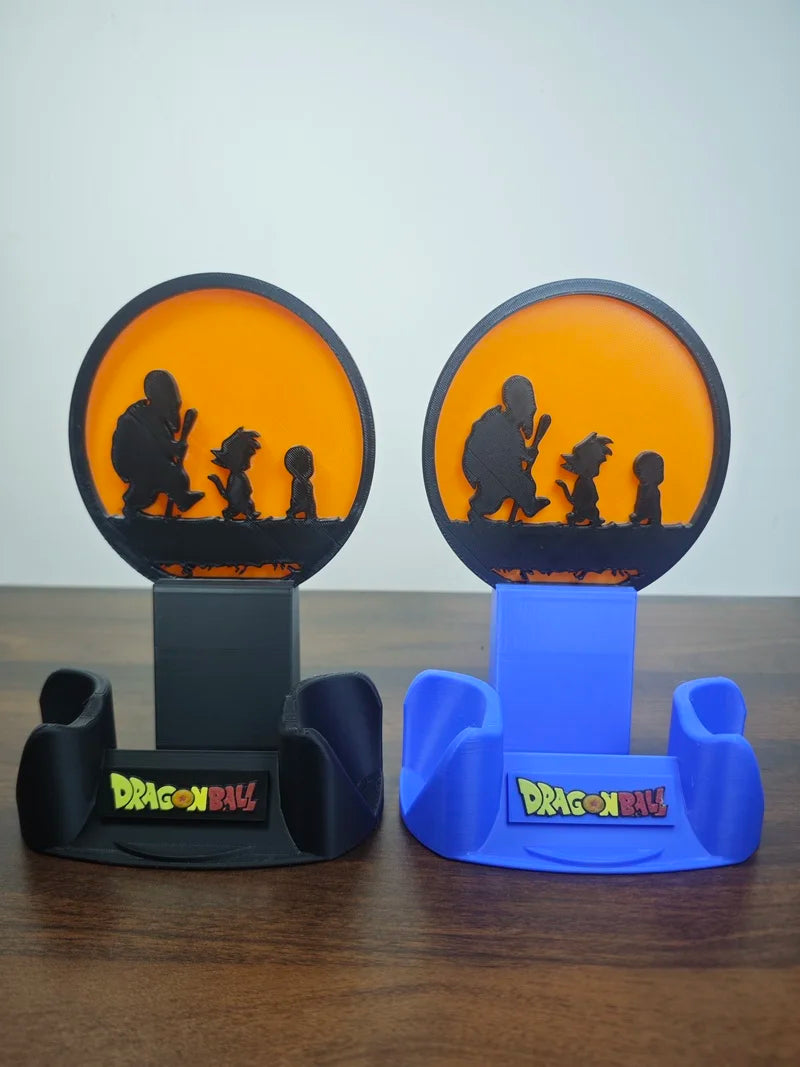 Support de manette noir Dragon Ball - Tortue Géniale Goku et Krilin en silhouettes