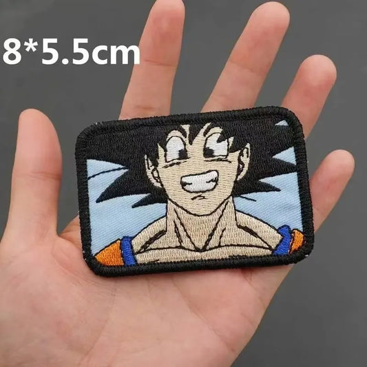 Dragon Ball geborduurde patch - Goku lachend op blauwe achtergrond