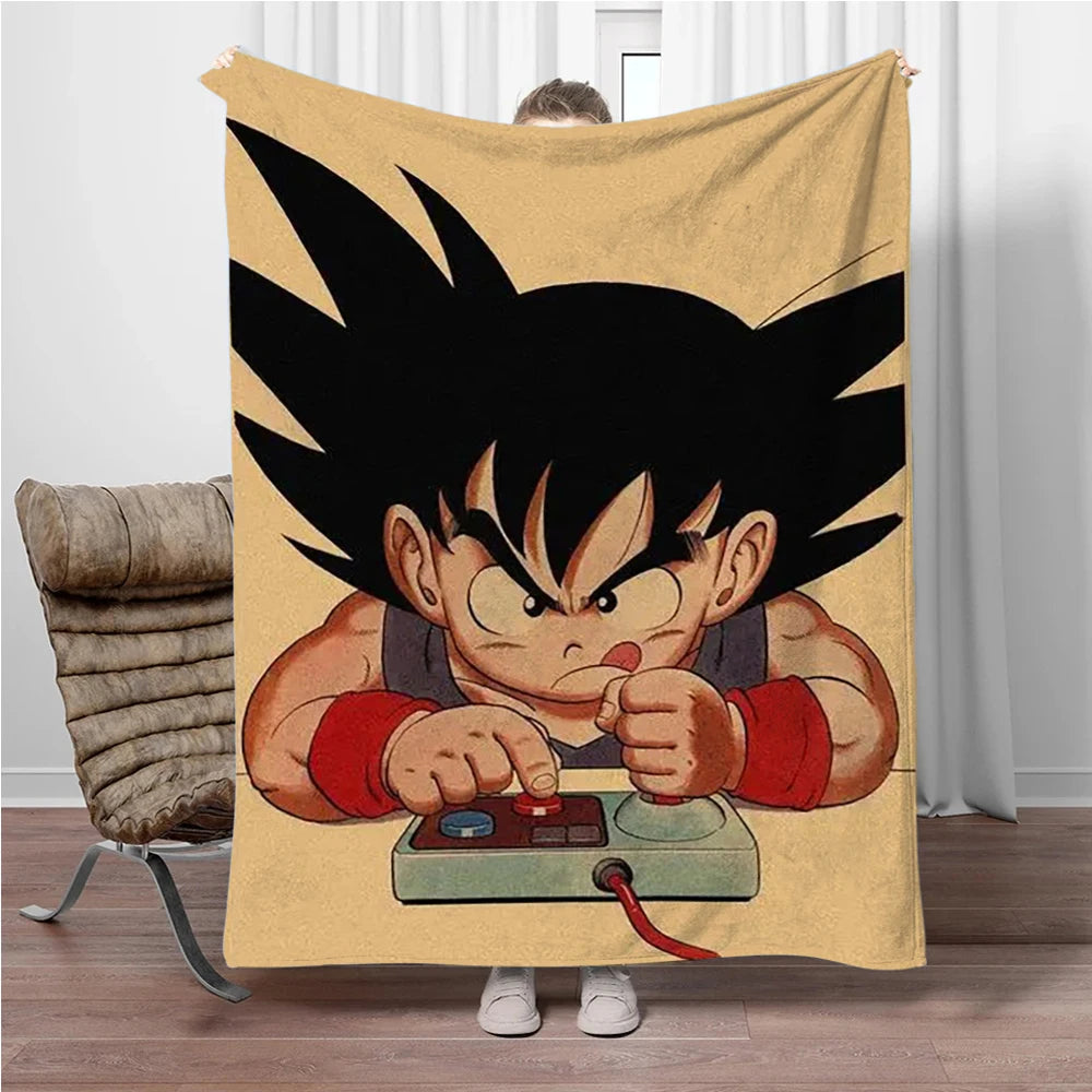 Plaid beige Dragon Ball - Goku enfant jouant à la console