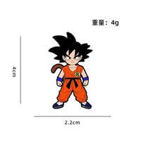 Goku child standing in orange outfit