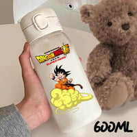Goku child raising his fist on cloud